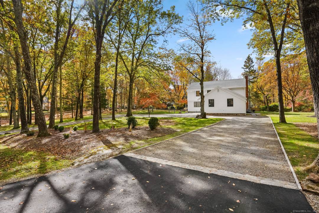 This beautifully renovated 5 bedroom Colonial in Lower Weston, Connecticut, exemplifies exceptional craftsmanship and attention to detail throughout.