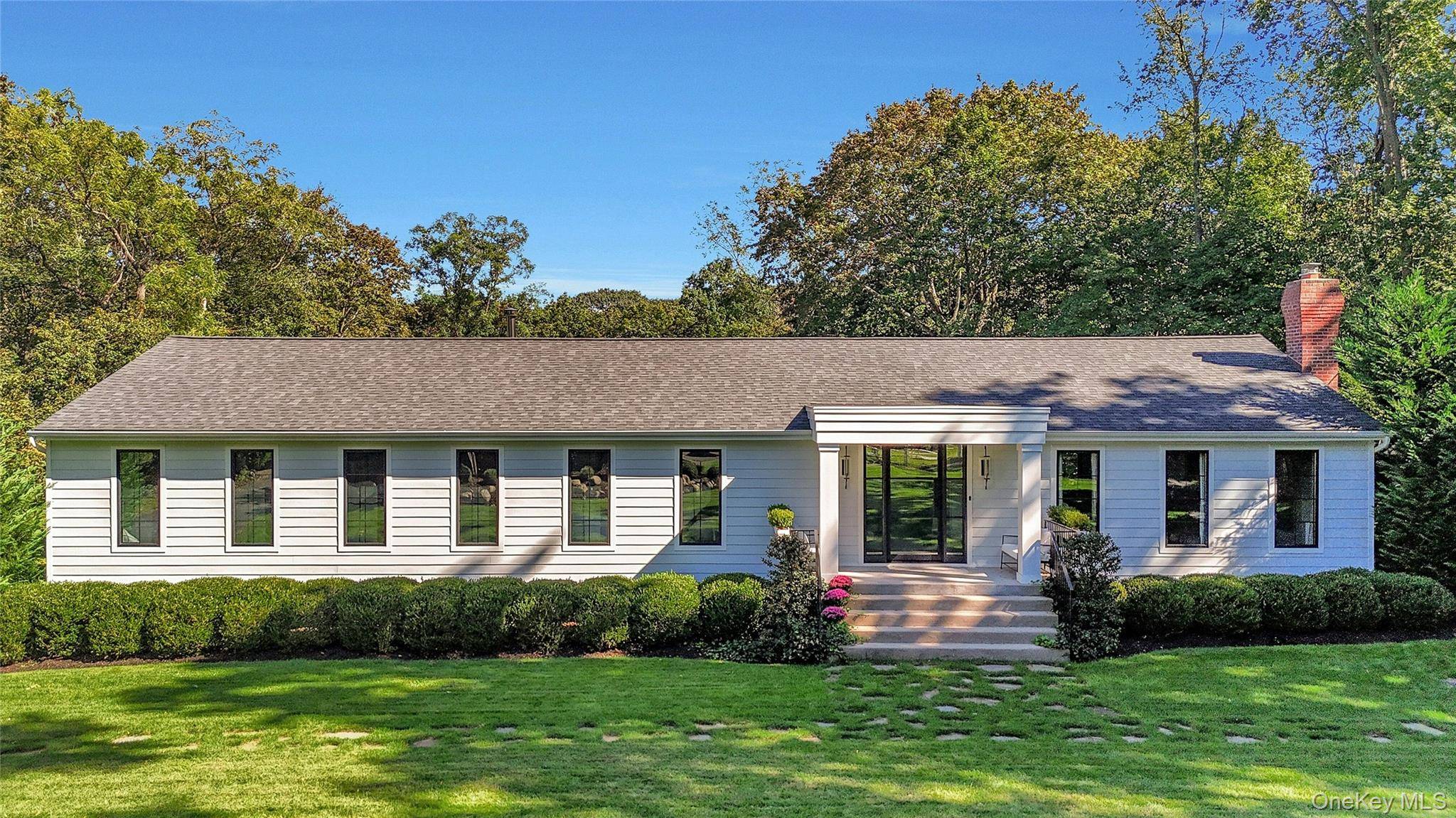 Experience the pinnacle of luxury at 262 Huntington Bay Road, Huntington Bay, NY an exquisite raised ranch that embodies sophisticated living.