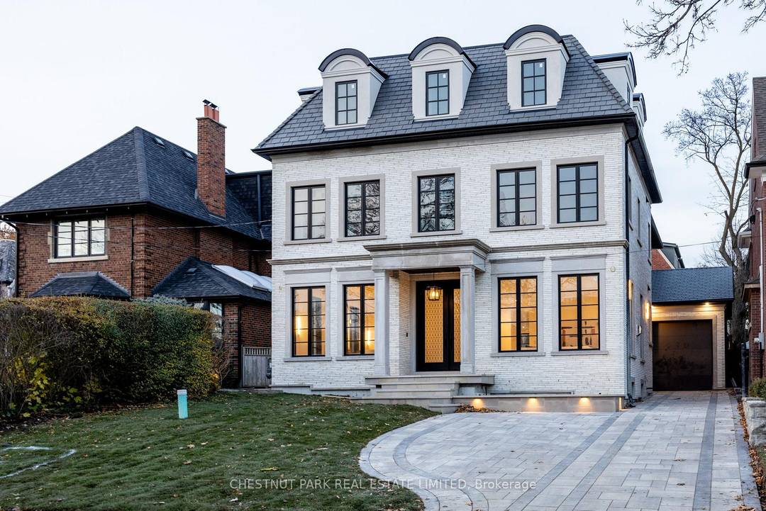 A newly built custom residence, designed by Spragge Architects, is perfectly positioned with southern exposure and captivating winter city views.