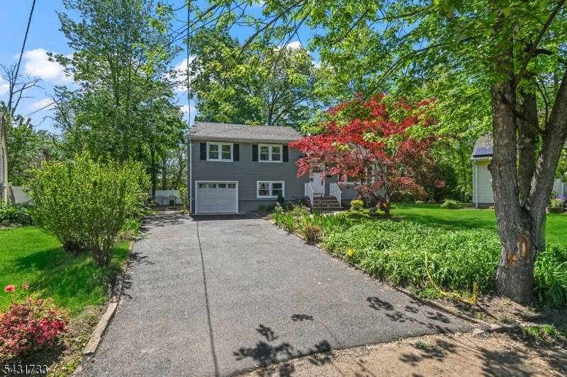 Stunningly remodeled 3 bedroom, 2 full bath split level home in highly sought after Scotch Plains !