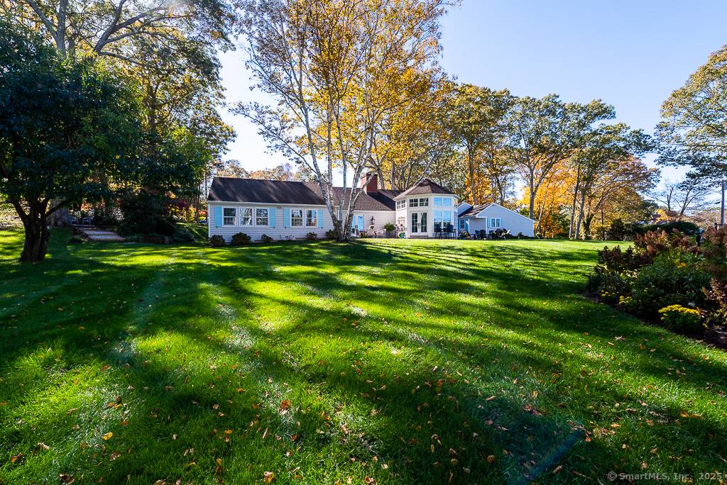 A sprawling luxury home offering one level living with stunning views of South Cove and quintessential Essex village beyond.
