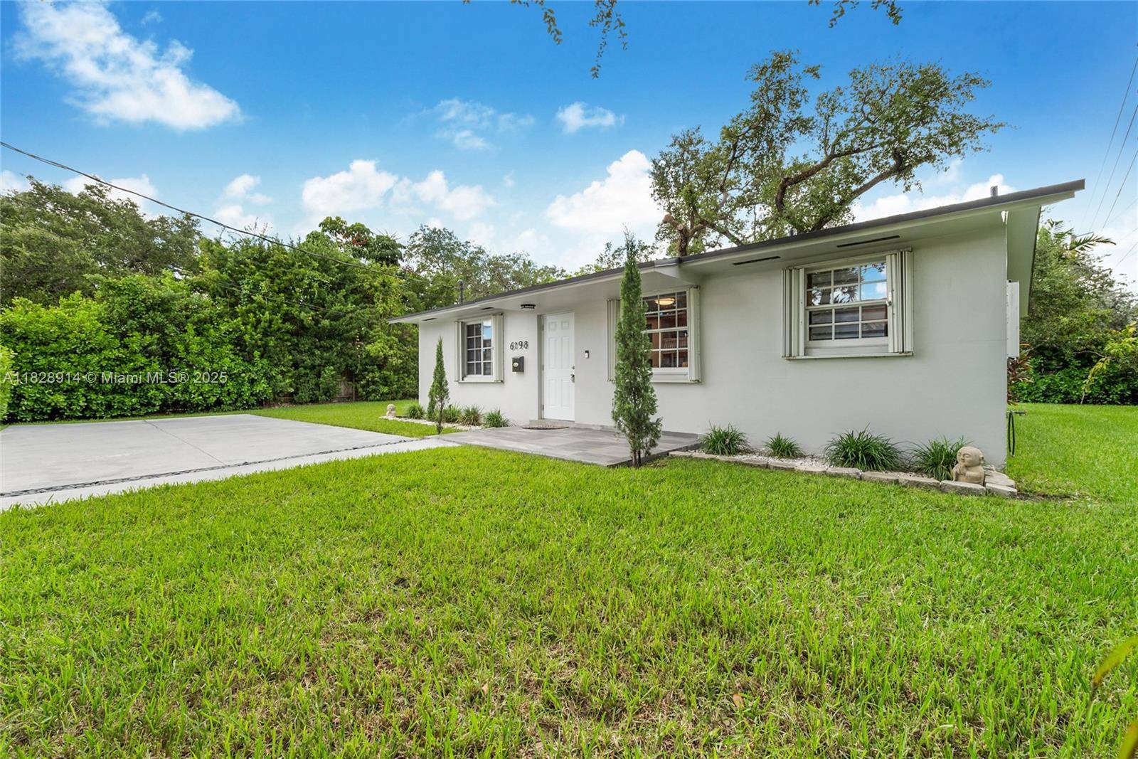 Charming amp ; fully furnished South Miami home featuring 3 spacious bedrooms amp ; 2 bathrooms with a desirable split floor plan, situated on an oversized corner lot in the ...