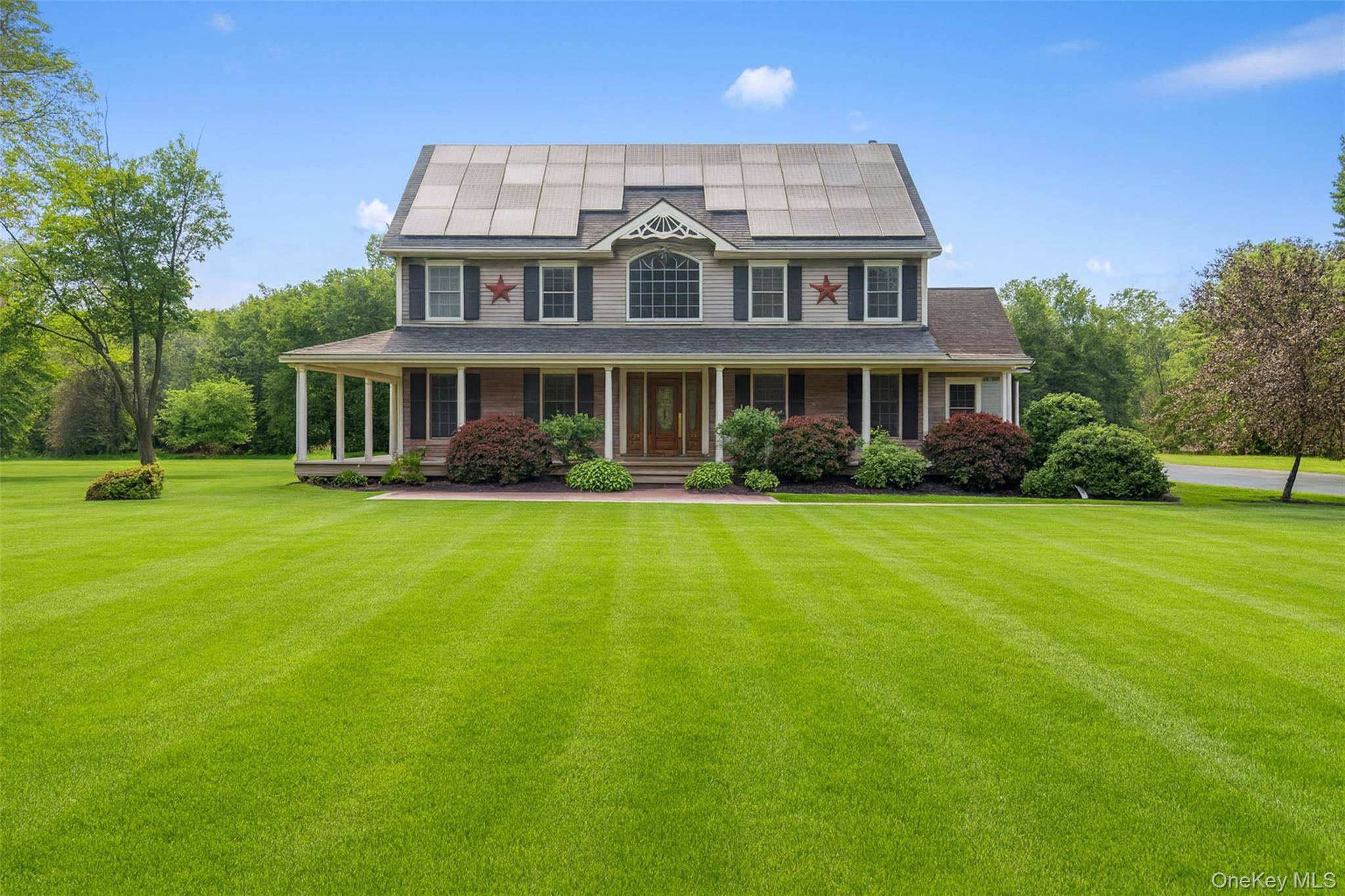 Welcome to 1252 Albany Post Road in Gardiner, New York an exceptional custom Colonial home set on 4.