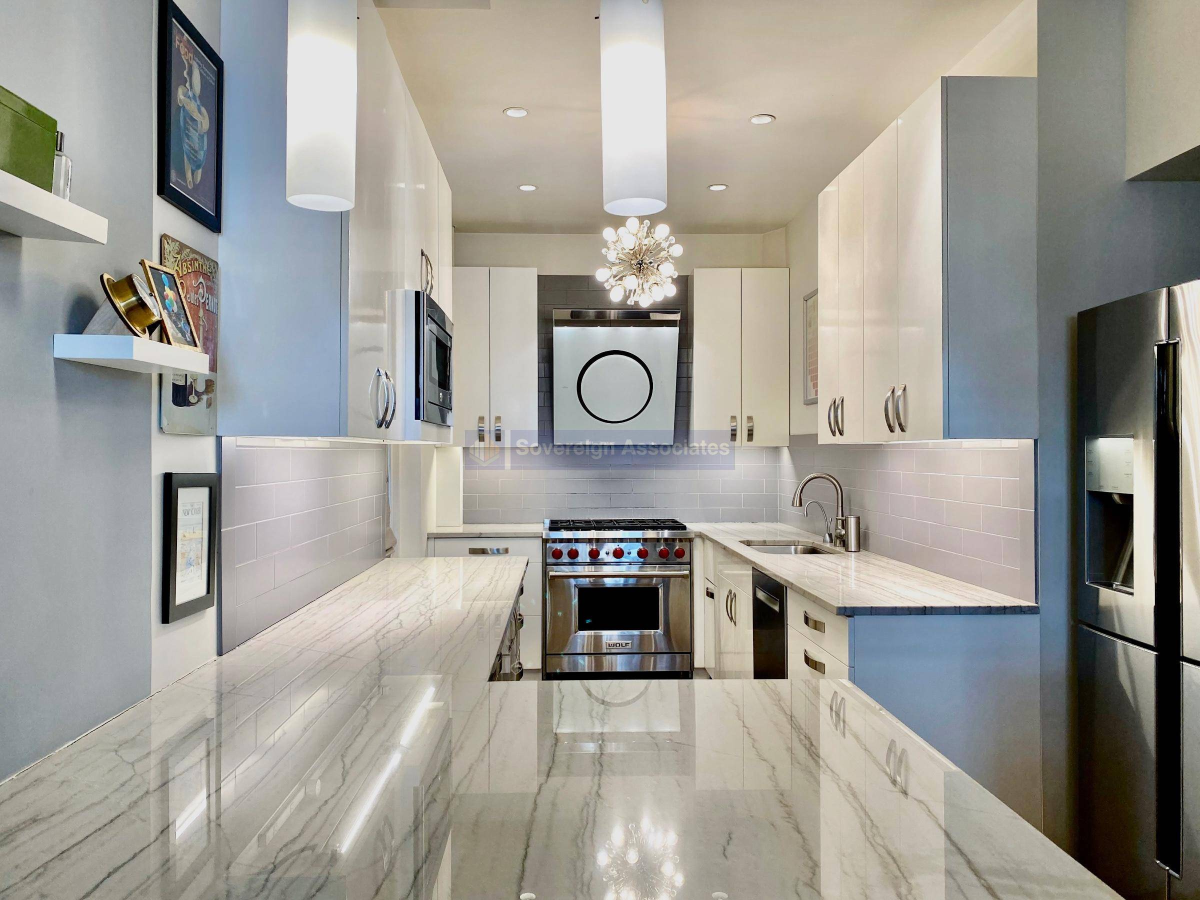 Enter the home via a classic deep entry hall that is a gallery waiting for your art and photos.