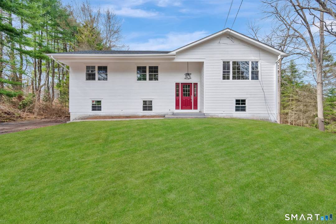 Welcome to this fully renovated home set on 1.