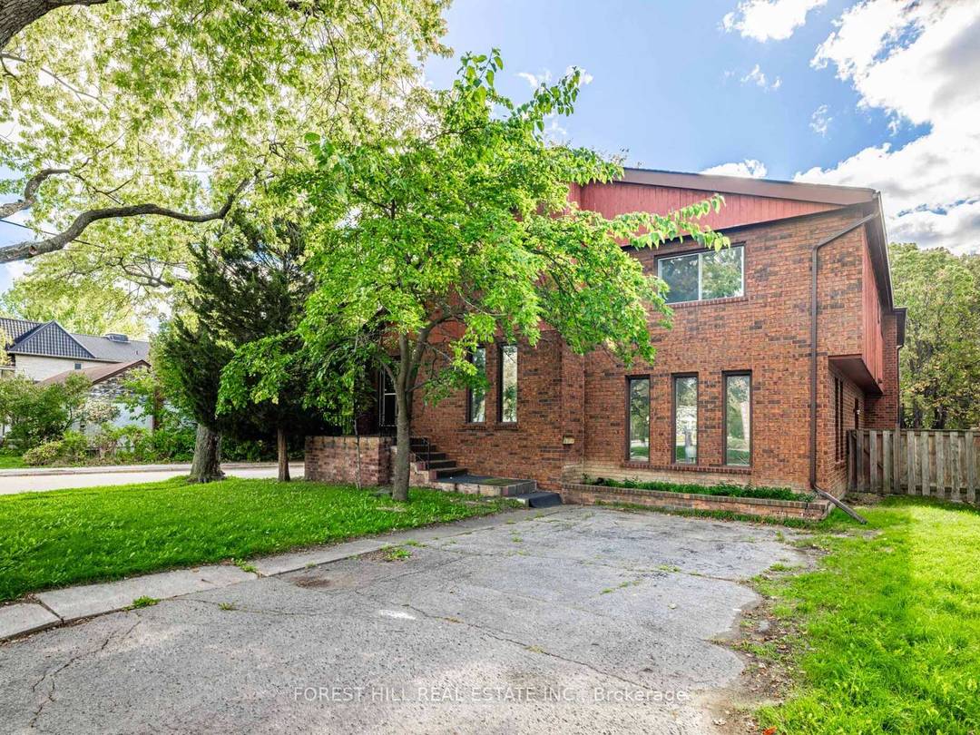 Welcome to this bright and spacious residence perfectly positioned on a 50x130 ft corner lot, offering nearly 3, 000 sq.