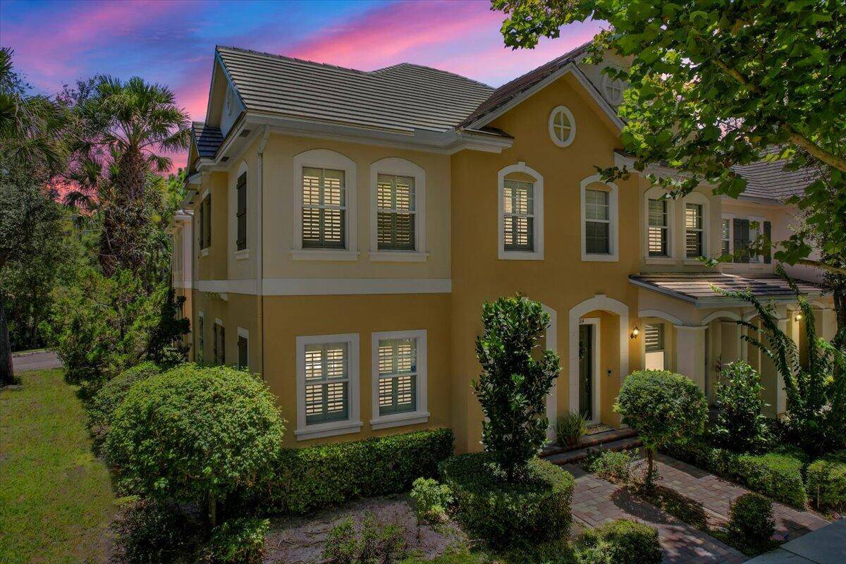 Highly sought after 4 bedroom Foxford model END UNIT townhome featuring a spacious STUDIO APARTMENT above the 2 car garage and IMPACT WINDOWS DOORS.