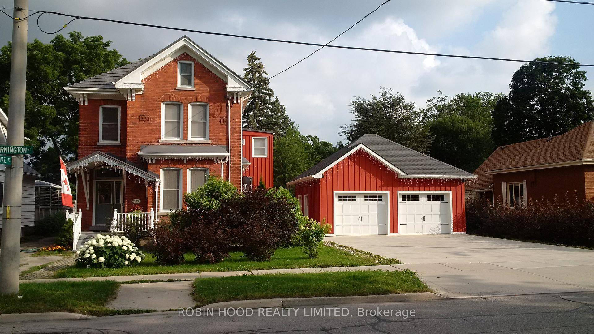 1885 Victorian red brick home on a double lot with severance potential.