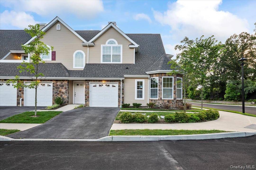 Welcome to the Essex model at Stone Ridge Estates, a 55 gated community in Dix Hills.
