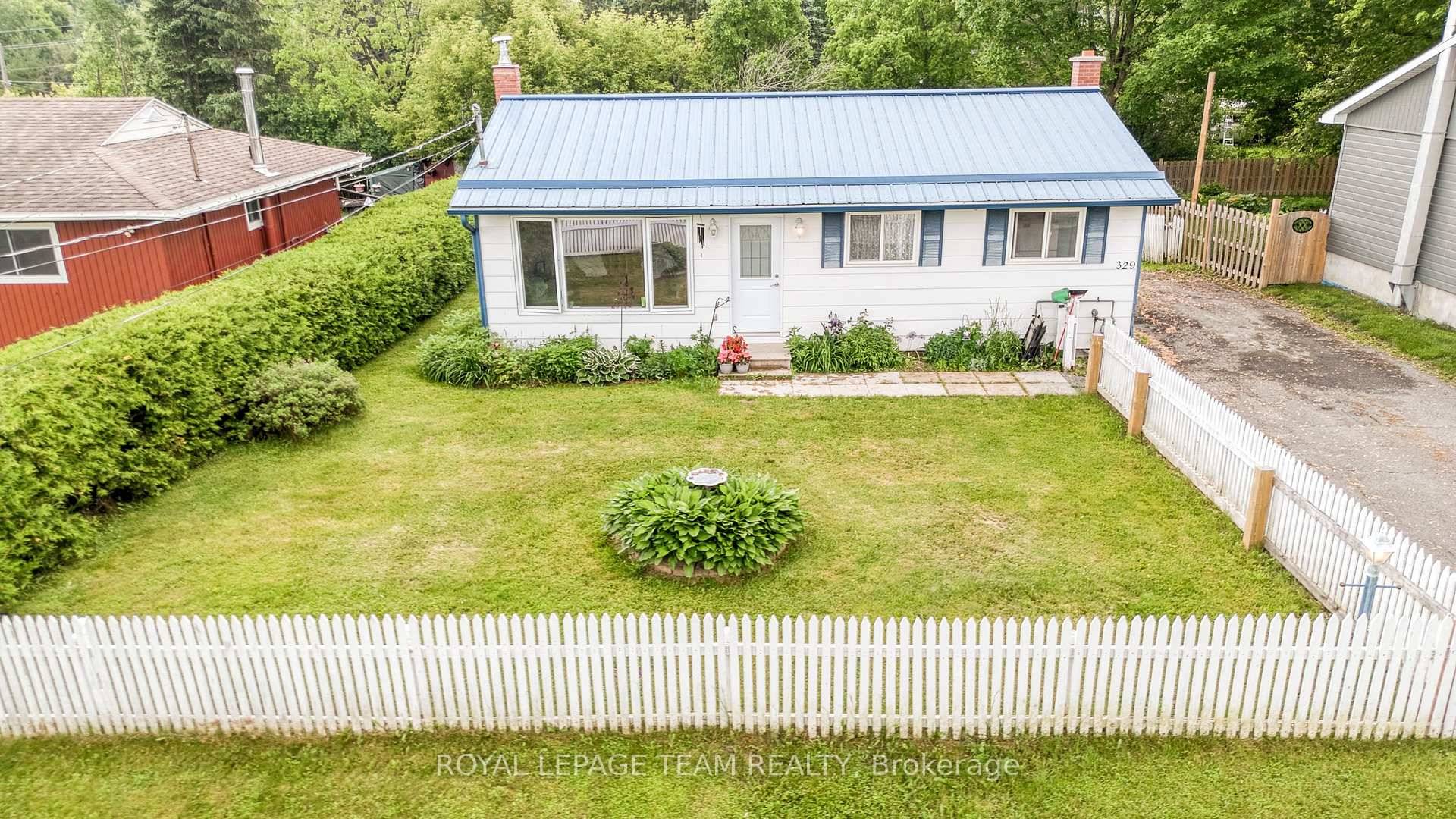Here's a charming 3 bedroom, 1 bathroom bungalow nestled in a peaceful area of town.