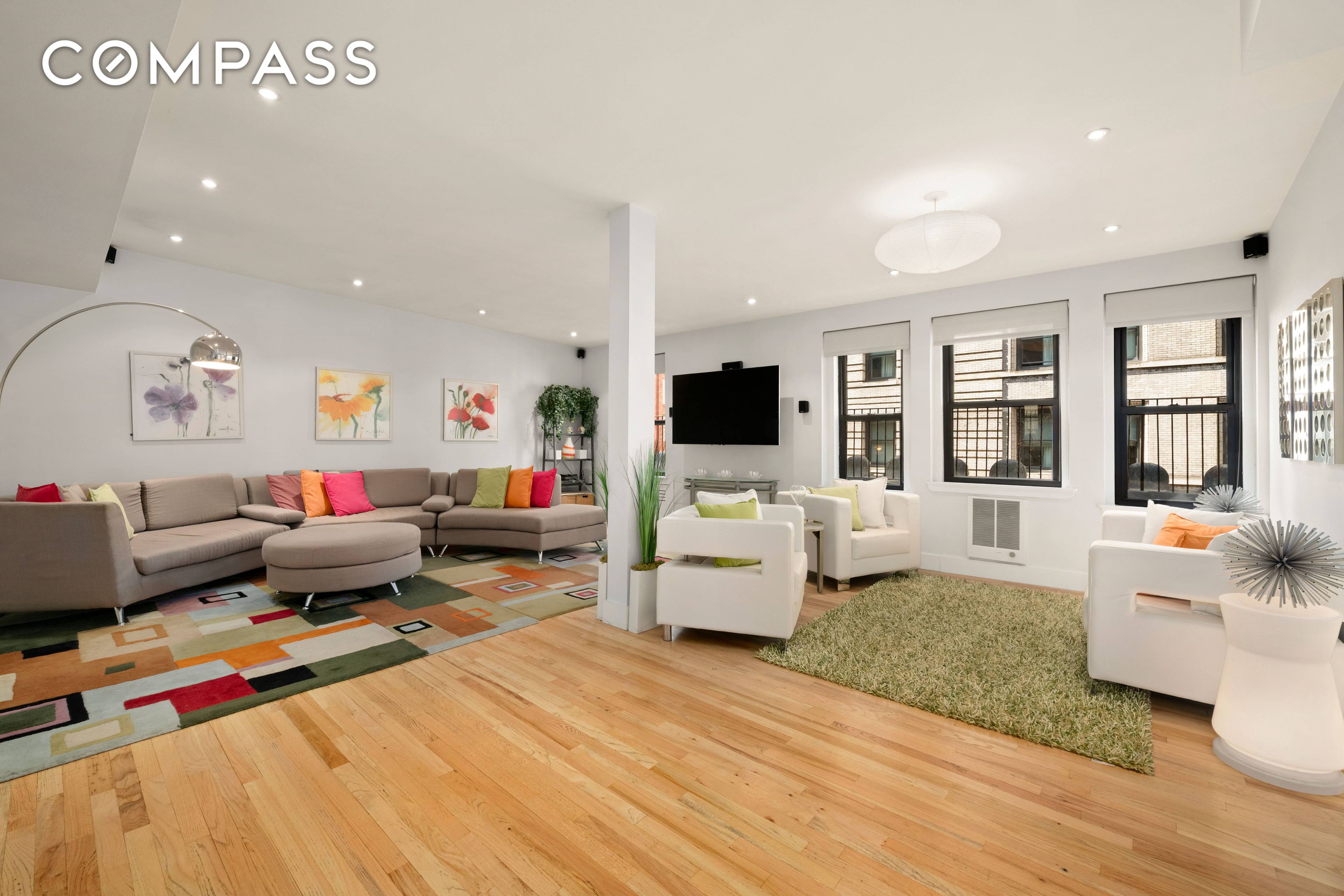 Charming Cottage in the Sky Spacious Two Bedroom Prewar Loft with Wraparound Terrace Welcome to your Manhattan oasis a light filled, prewar two bedroom, two bathroom loft spanning approximately 1, ...