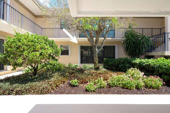 Impeccably remodeled first floor condo in gated community.