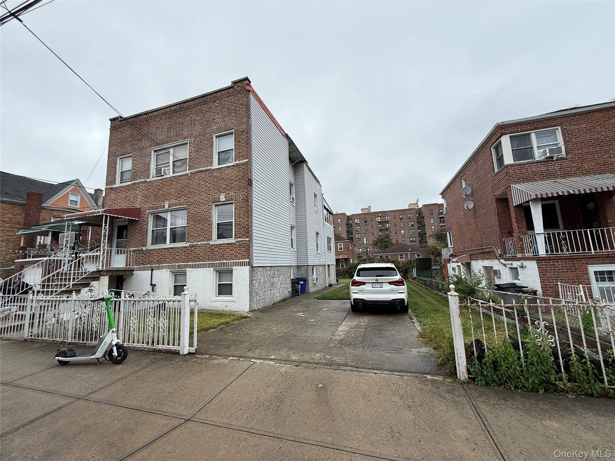 This detached legal 3 family on a double lot is located in desirable Morris Park area of The Bronx.