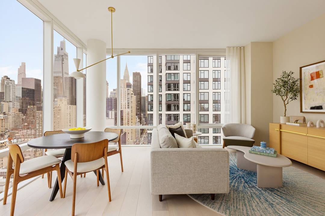 Luxury One bedroom home with 10' floor to ceiling windows and open skyline views.