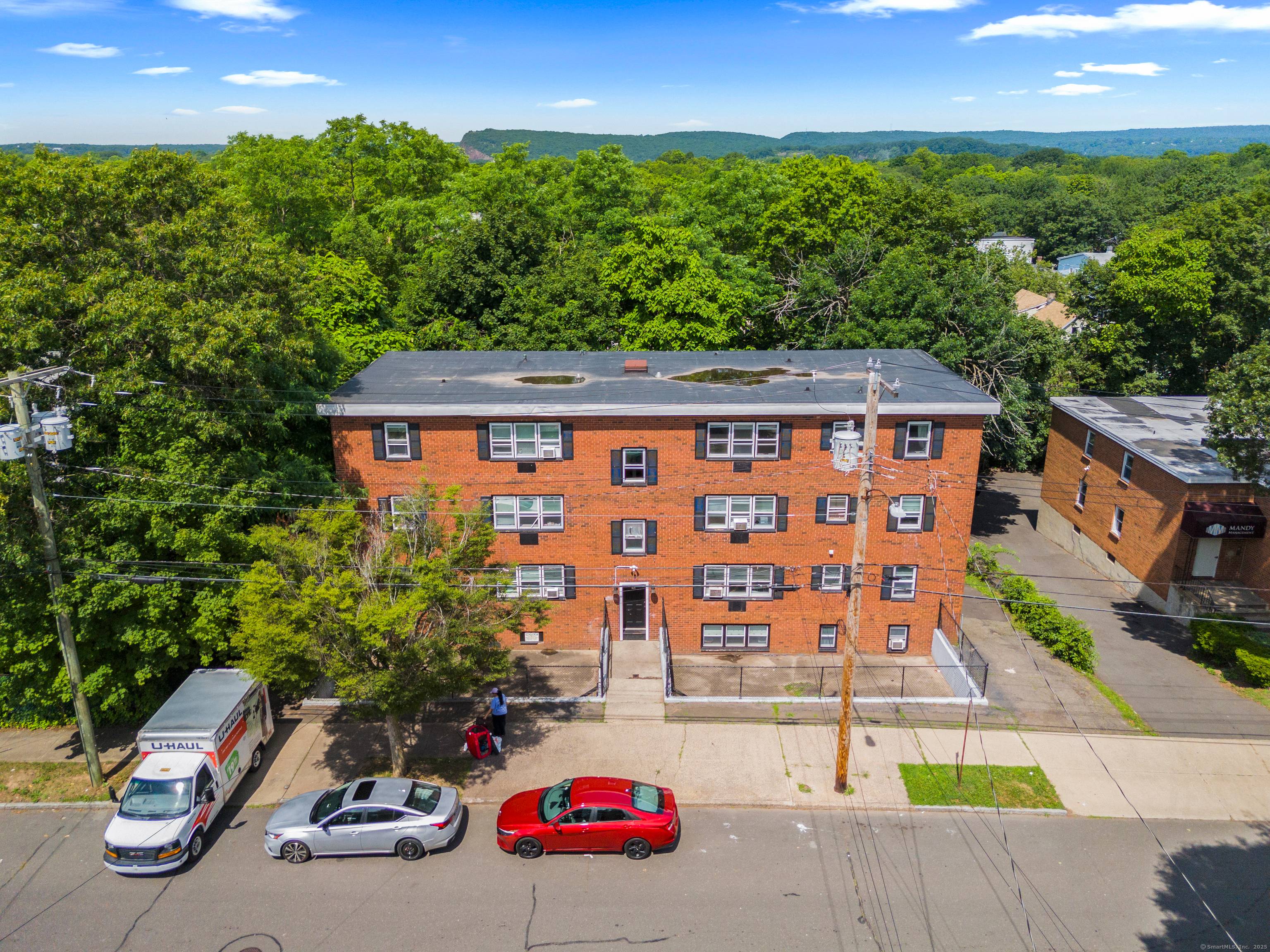 Amazing fully occupied 7 unit brick building two blocks away from Science Park, Albertus Magnus and a short bike ride to Downtown New Haven Yale !