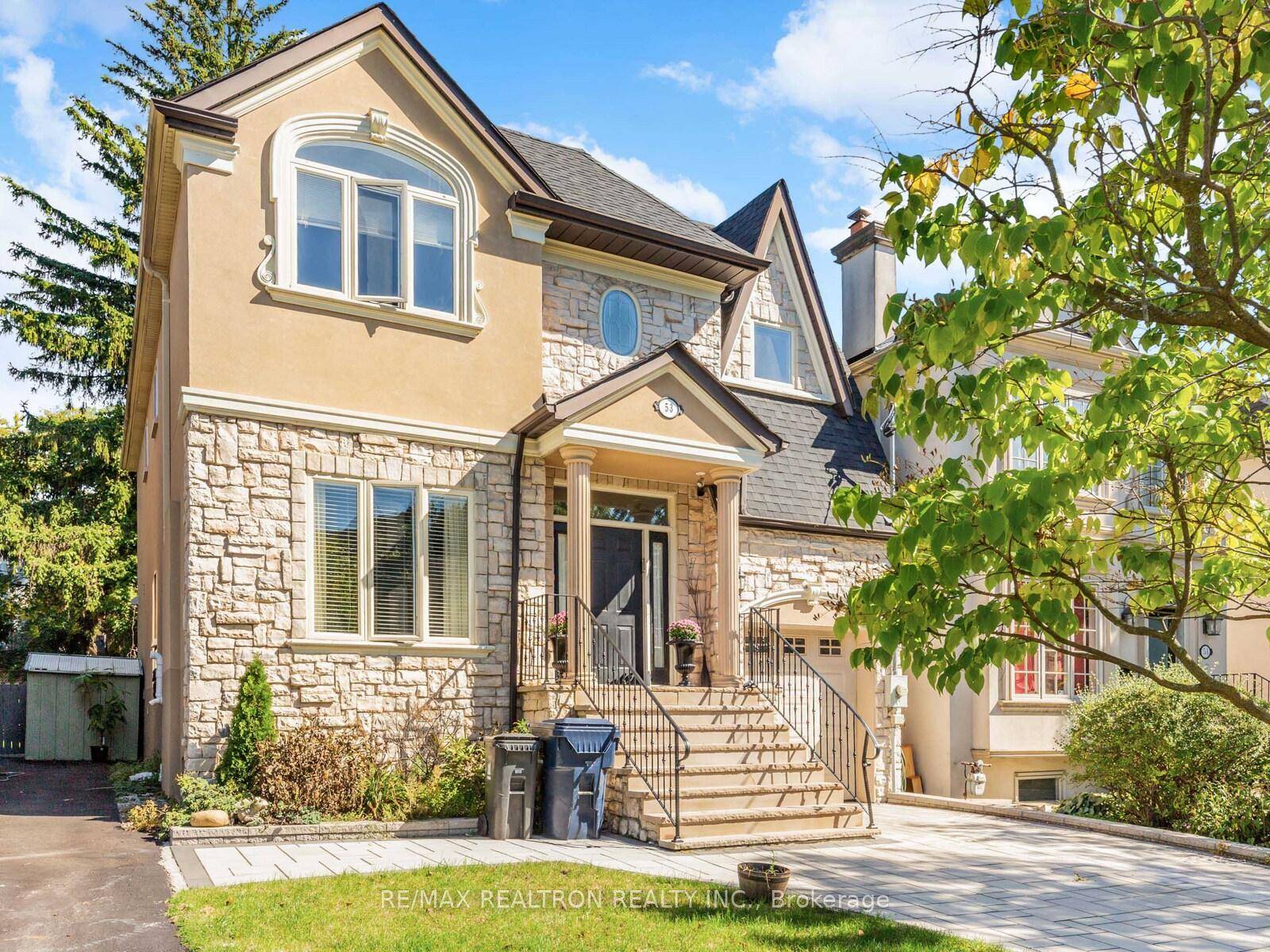 Step into this beautifully crafted custom residence offering three full levels of refined living space.