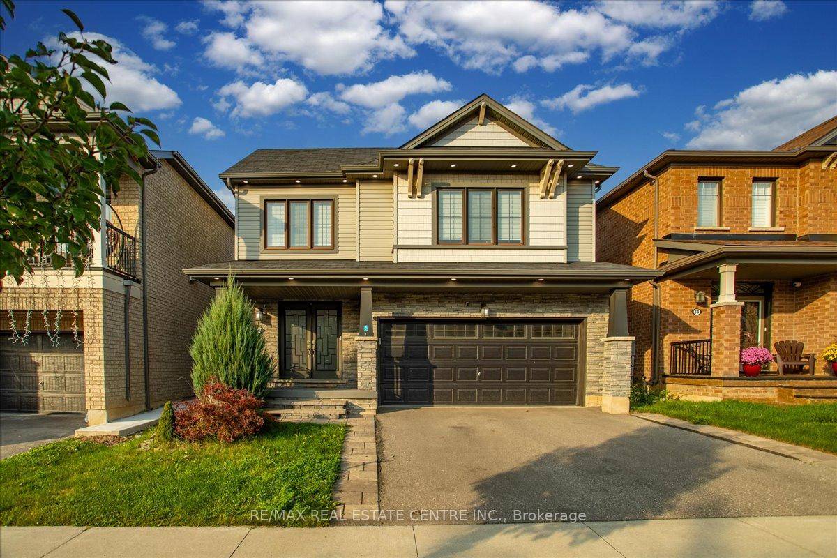 Empire Homes stunning and spacious 4 bedrm 3 Washroom, 2 Storey 2400 sq ft home w massive curb appeal, exterior pot lights, well manicured front rear lawns, beautifully land hardscaped, ...