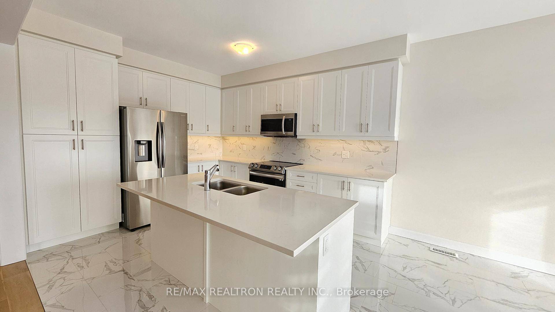 Two Years New, charming layout detached house with a double garage and double door entrance, nestled on a premium ravine lot.