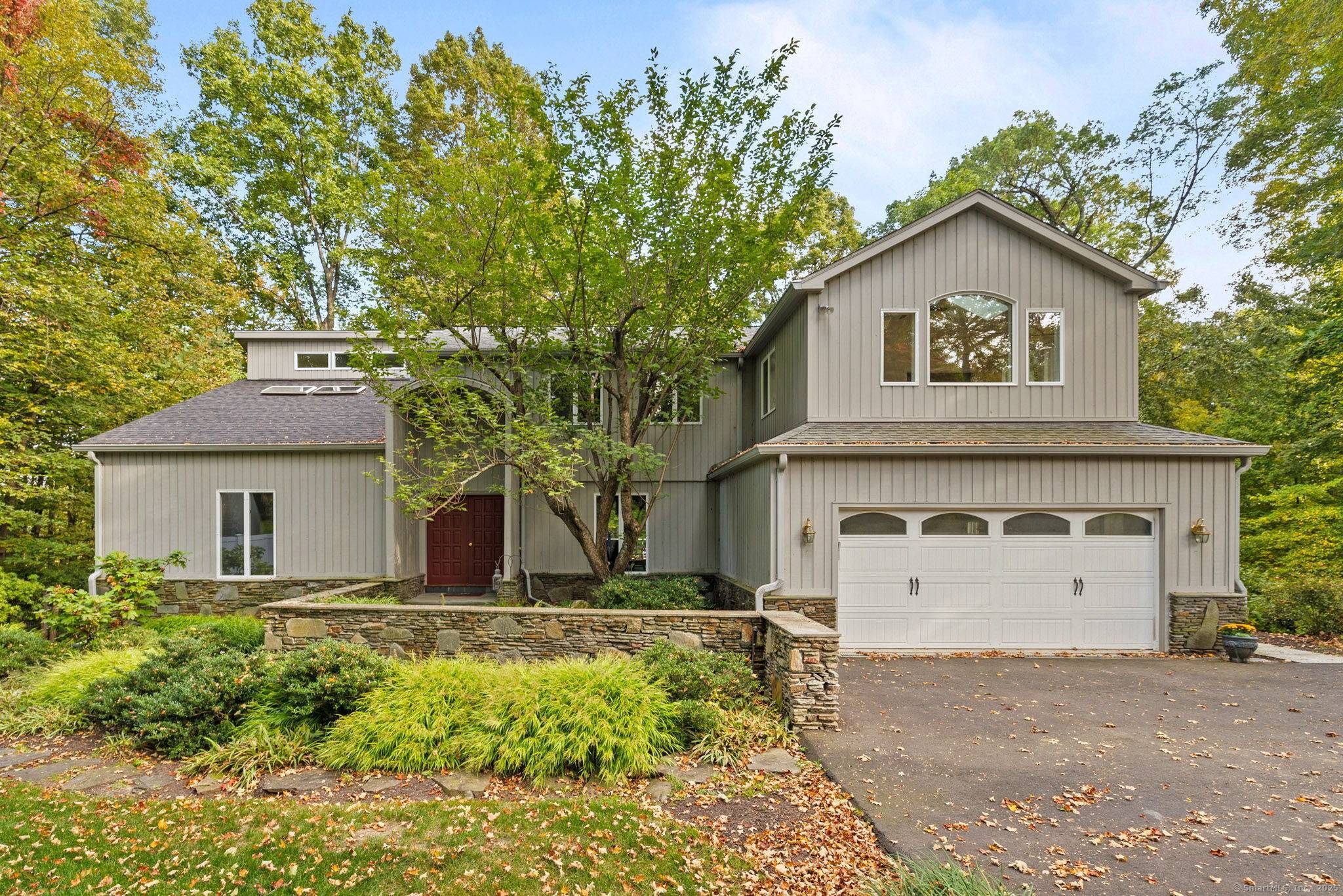 Peaceful contemporary living awaits at this unique home, set on a one acre lot with direct access to the Canal Road path.