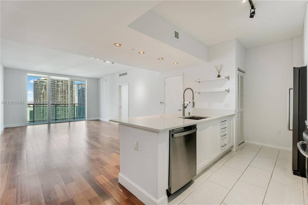 Experience luxury high rise living in this stunning 2BR 2BA residence at The Plaza at Brickell, showcasing dramatic city skyline views from every room.