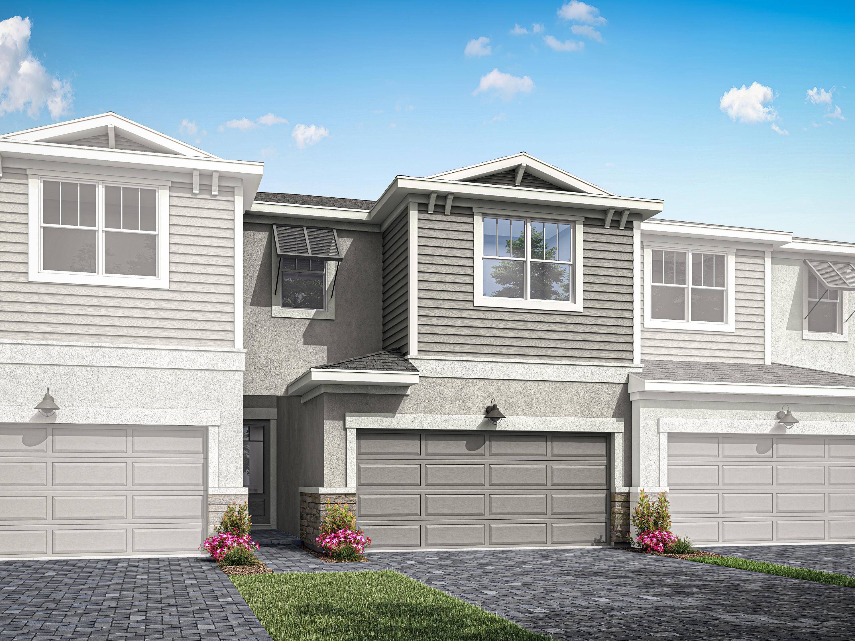 Step into the two story foyer of this exquisite 1, 865 sq ft townhome and you are greeted by spacious comfort.