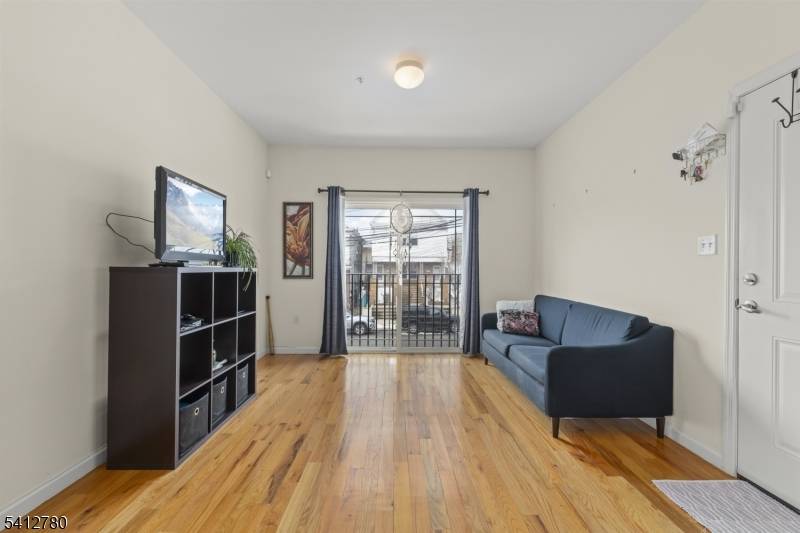 Discover 56 Delaware St, a stunning two family home built in 2017, located in the desirable Peterstown section of Elizabeth, NJ.