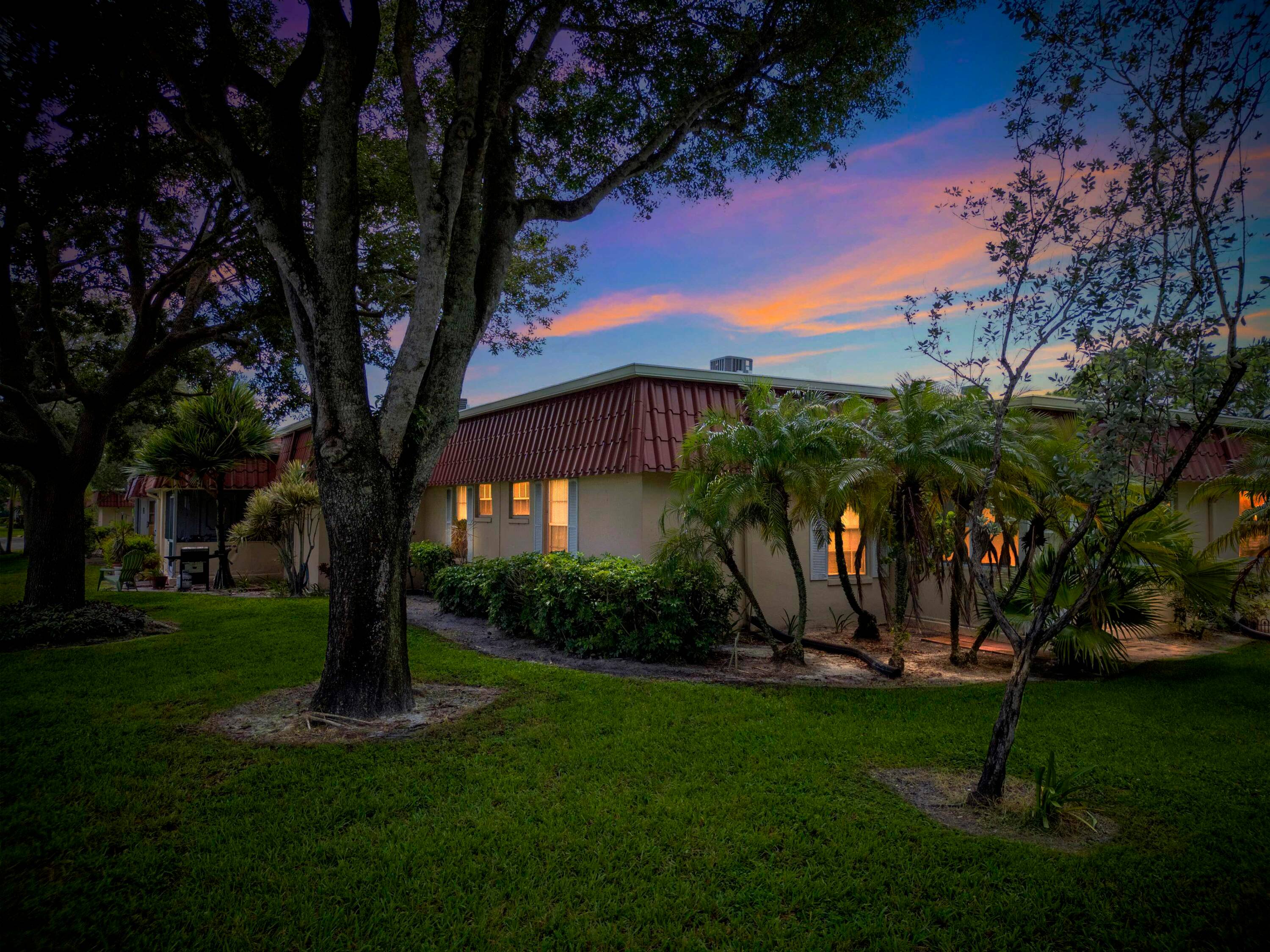 Welcome to this beautifully furnished villa in Covered Bridge, one of Lake Worth's most desirable 55 communities.