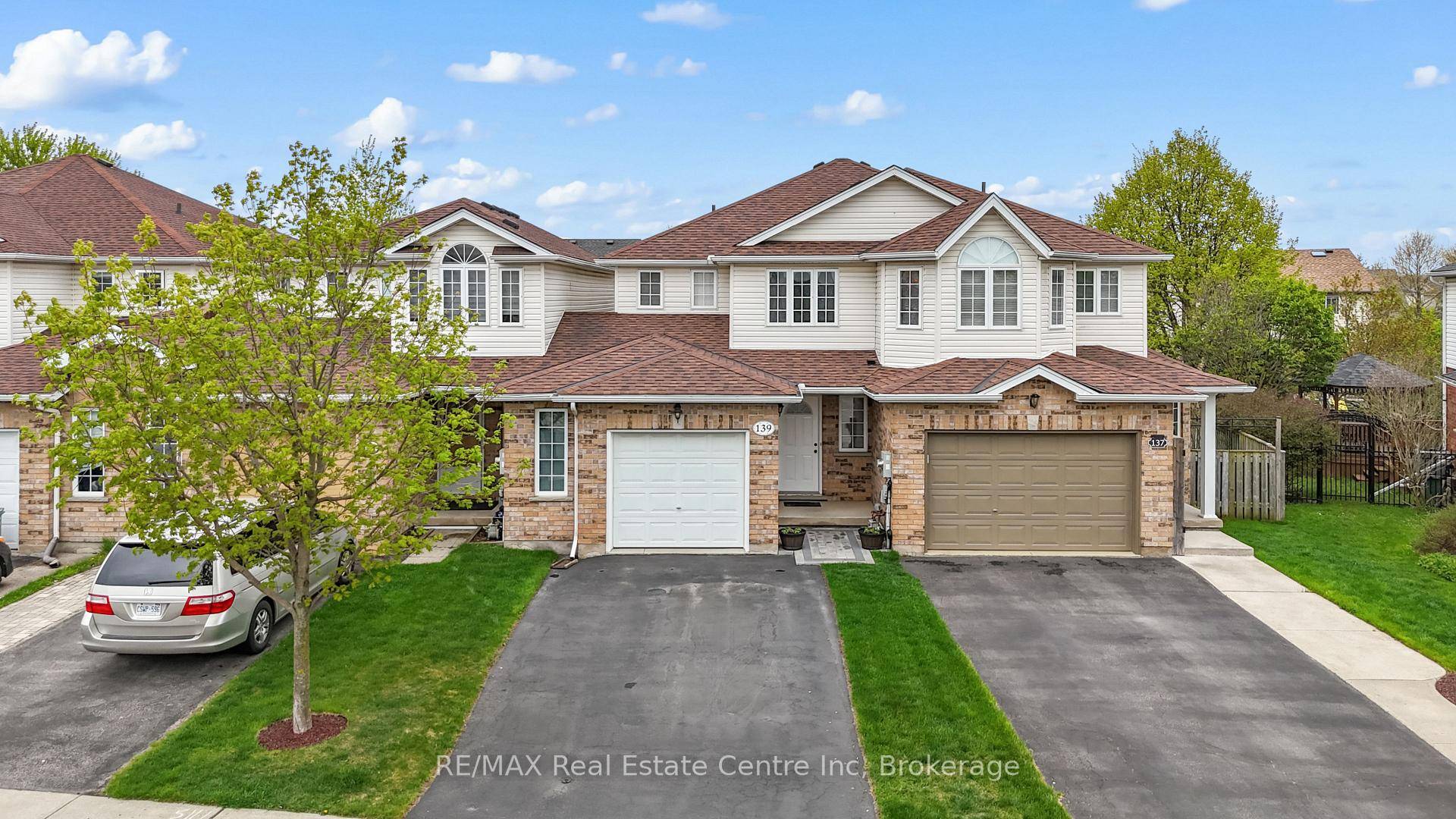 Welcome to 139 Gosling Gardens a rare freehold link style townhome in Guelph's sought after south end.