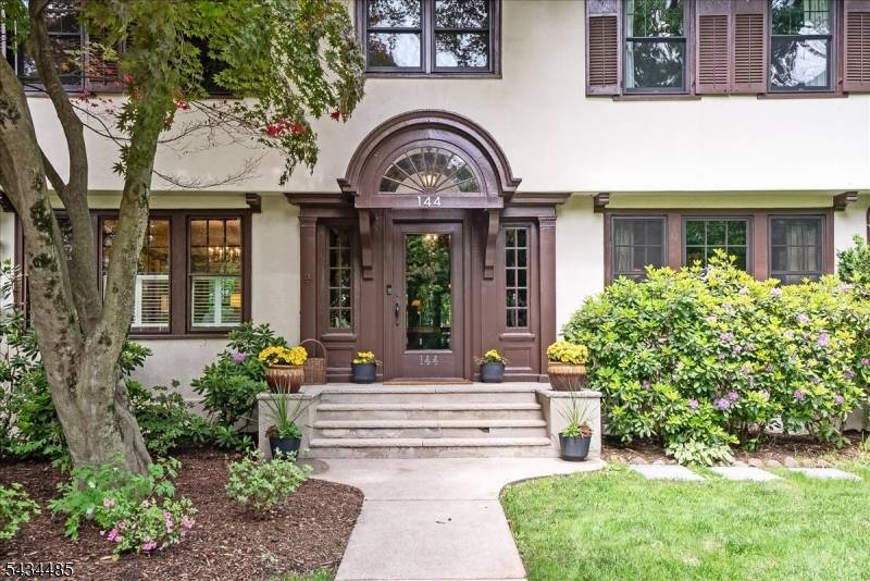 Grand Center Hall Colonial built in the Prairie School Arts Crafts style with gorgeous details throughout.