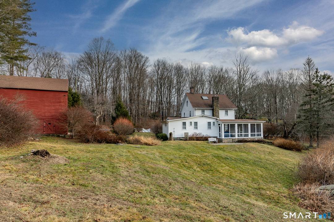 Rarely available. 1880 antique gem on 10 acres, with a first level primary bedroom and bath, situated on one of Bridgewater's most prestigious and quiet roads, offering a private setting.