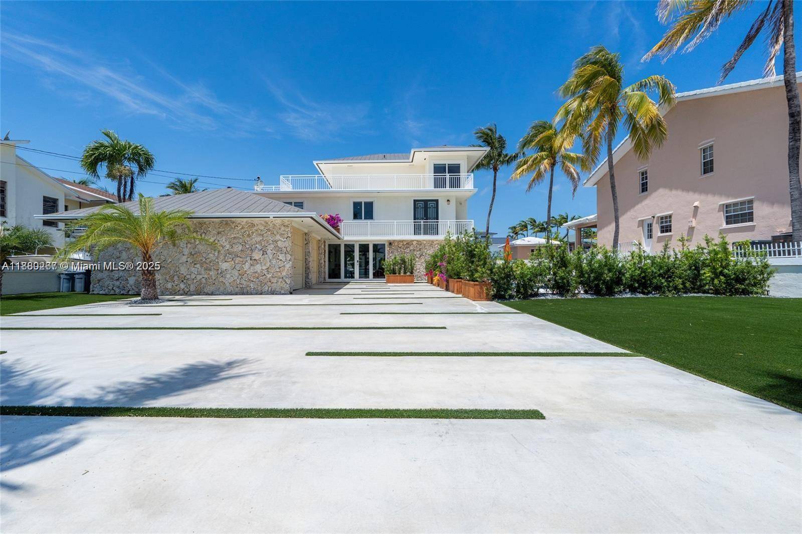 Experience modern luxury in this 3 story Port Largo home featuring 4 bedrooms, 5.