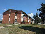 Move in ready and full of natural light, this bright and spacious one bedroom unit is located on the main floor, offering easy access and a functional open concept layout.