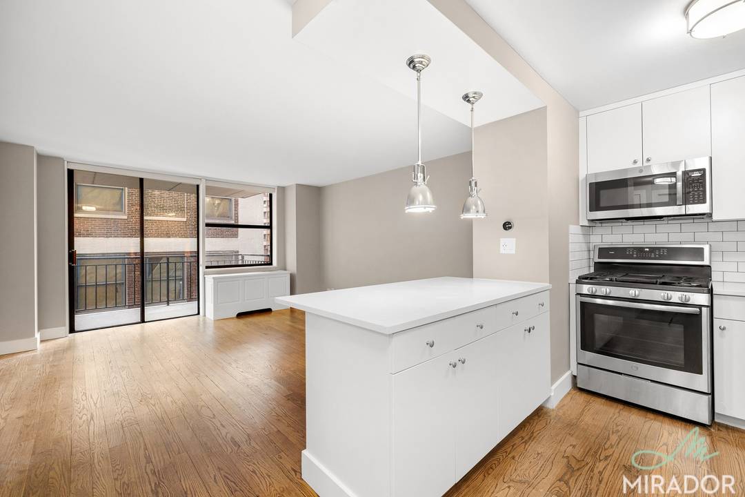 Stunning gut renovated 2 bedroom 1 bath with a private balcony and water views at New York Tower.