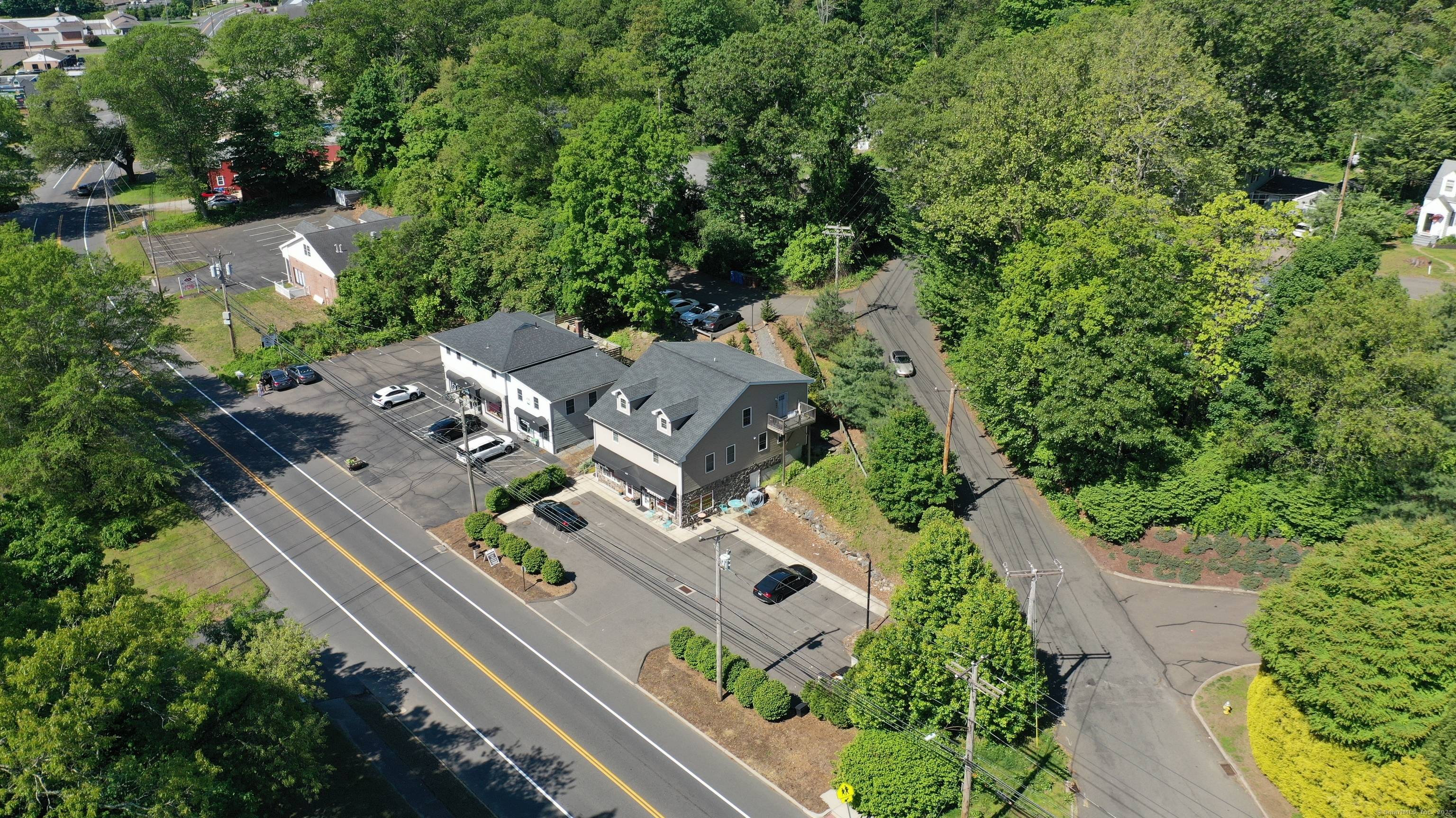 Mixed use commercial and residential buildings to be sold strictly as package with owner financing.