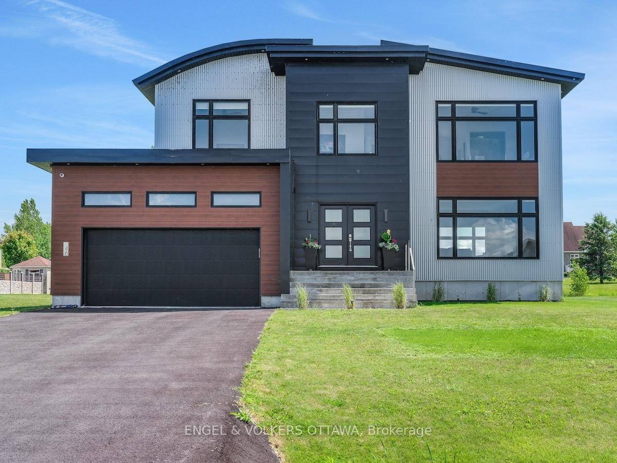 Welcome to this exceptional custom built, automated home, crafted with precision and modern elegance.