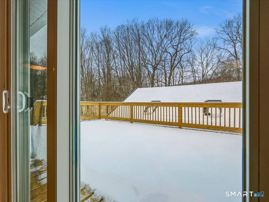 This exceptional property offers five bedrooms plus a spacious primary suite including a large bathroom with washer and dryer.