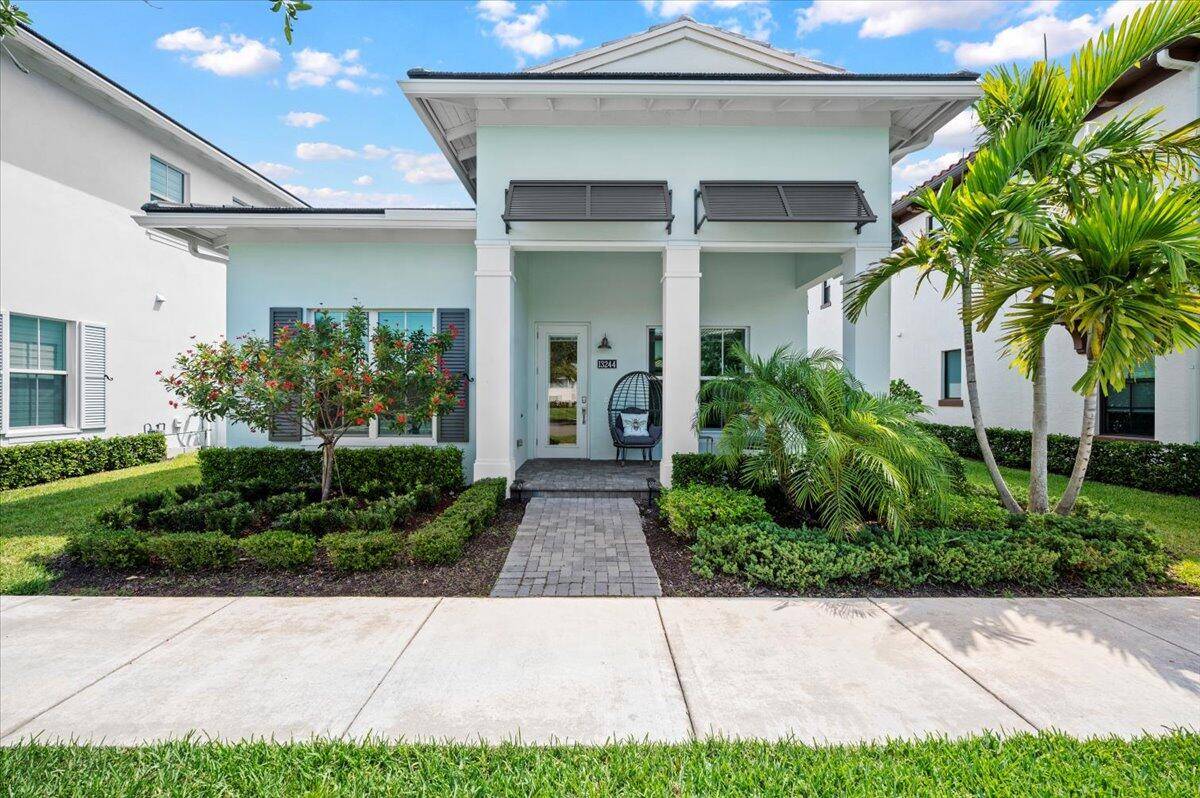 One level living in Alton with this upgraded Island Style home featuring 12 foot ceilings on an oversized premium homesite with double the typical spacing between the neighboring home.