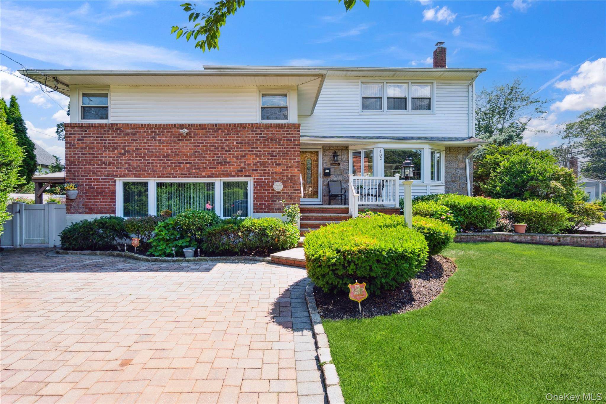 Over 2800 square foot expanded and dormered 4 bedroom split, Tremendous living space includes living room, formal dining room, eat in kitchen and family room.