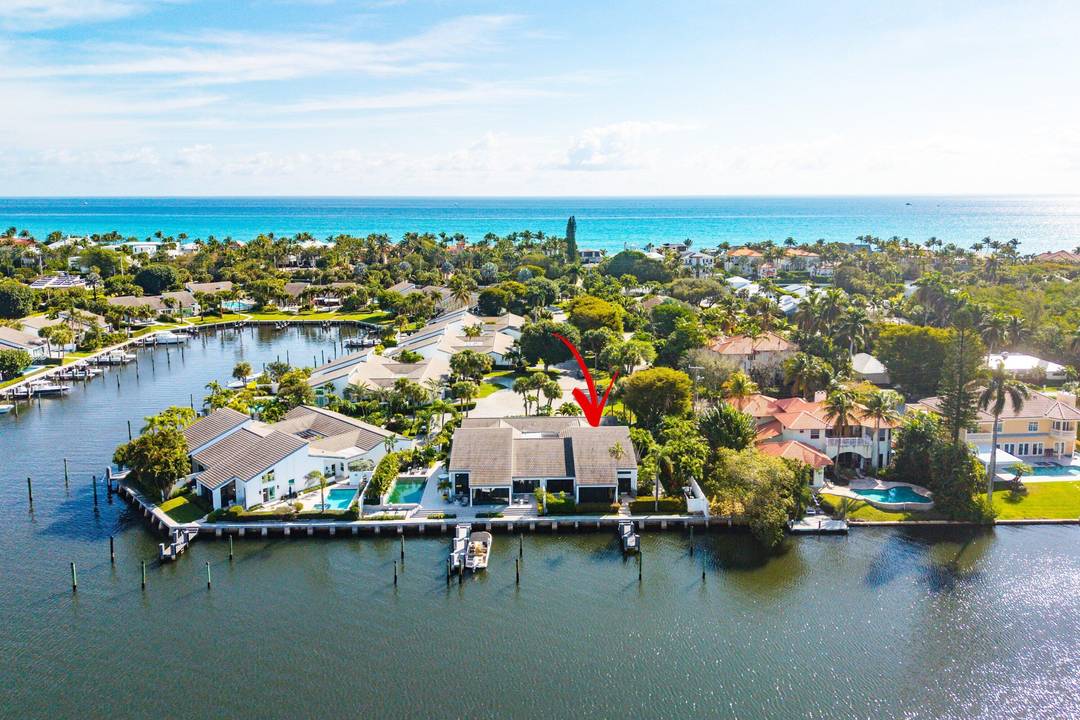 Experience the ultimate South Florida waterfront lifestyle in this private coastal retreat offering breathtaking, wide water views across a protected wildlife sanctuary and the Intracoastal.