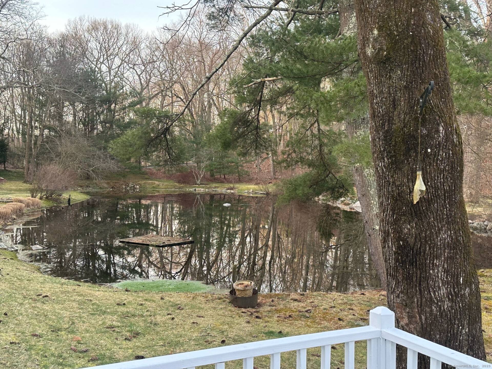 Move right into this idyllic private cottage in North Stamford offering an open floor plan, living room with slider to deck overlooking two beautiful ponds, dining area with slider to ...