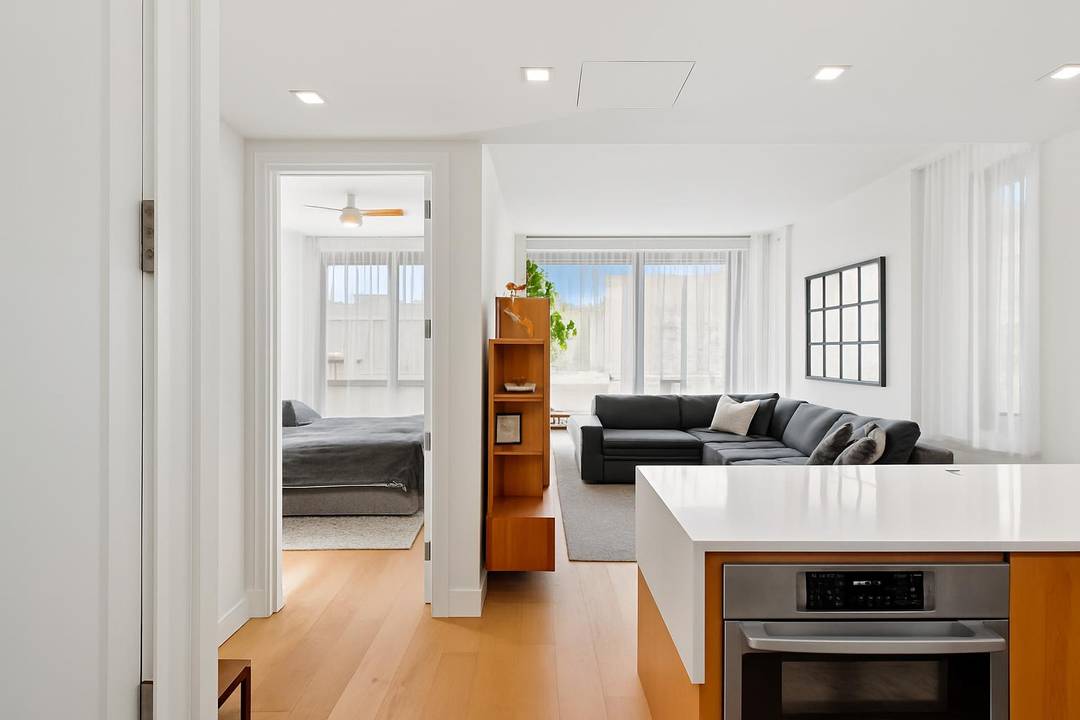Soaked in natural light and defined by nearly 10 foot ceilings and oversized windows, this 2BR one Bathroom condo blends refined design with everyday functionality in one of Williamsburg s ...