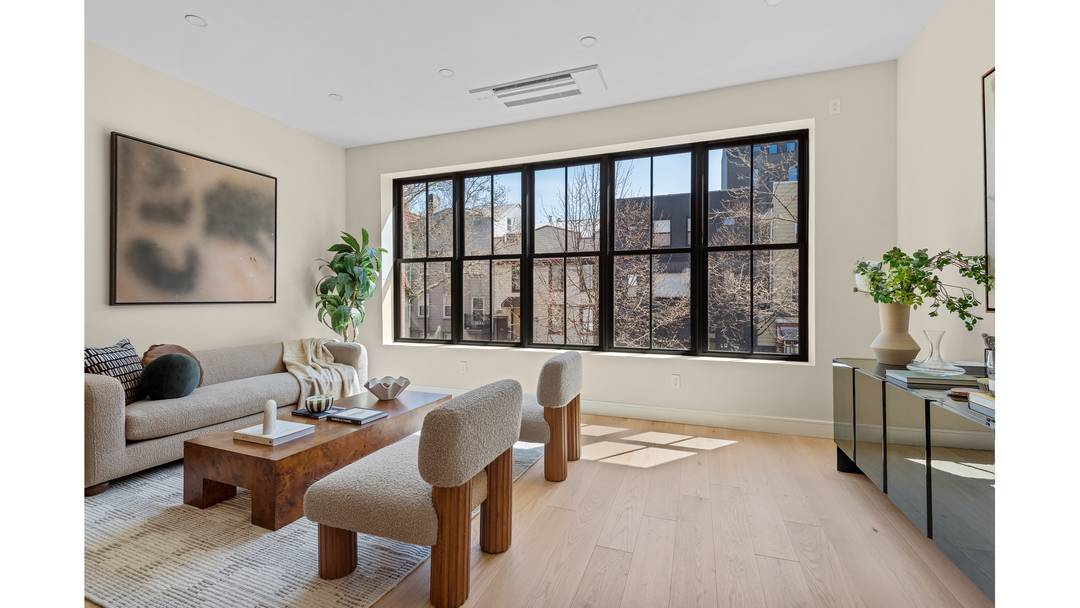 Welcome to 21 Conselyea Street, Williamsburg's newest boutique condominium, offering an exclusive collection of three thoughtfully designed residences.