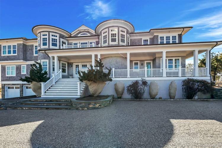 Outstanding state of the art professionally decorated 7300SF oceanfront home.