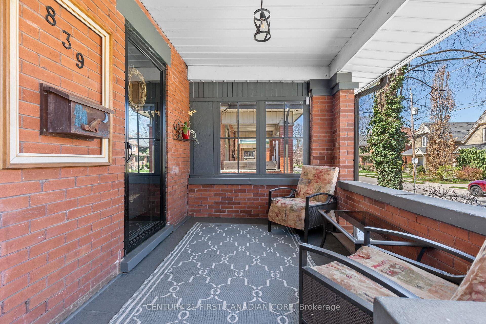 839 Dufferin is welcoming with great curb appeal and a covered porch.