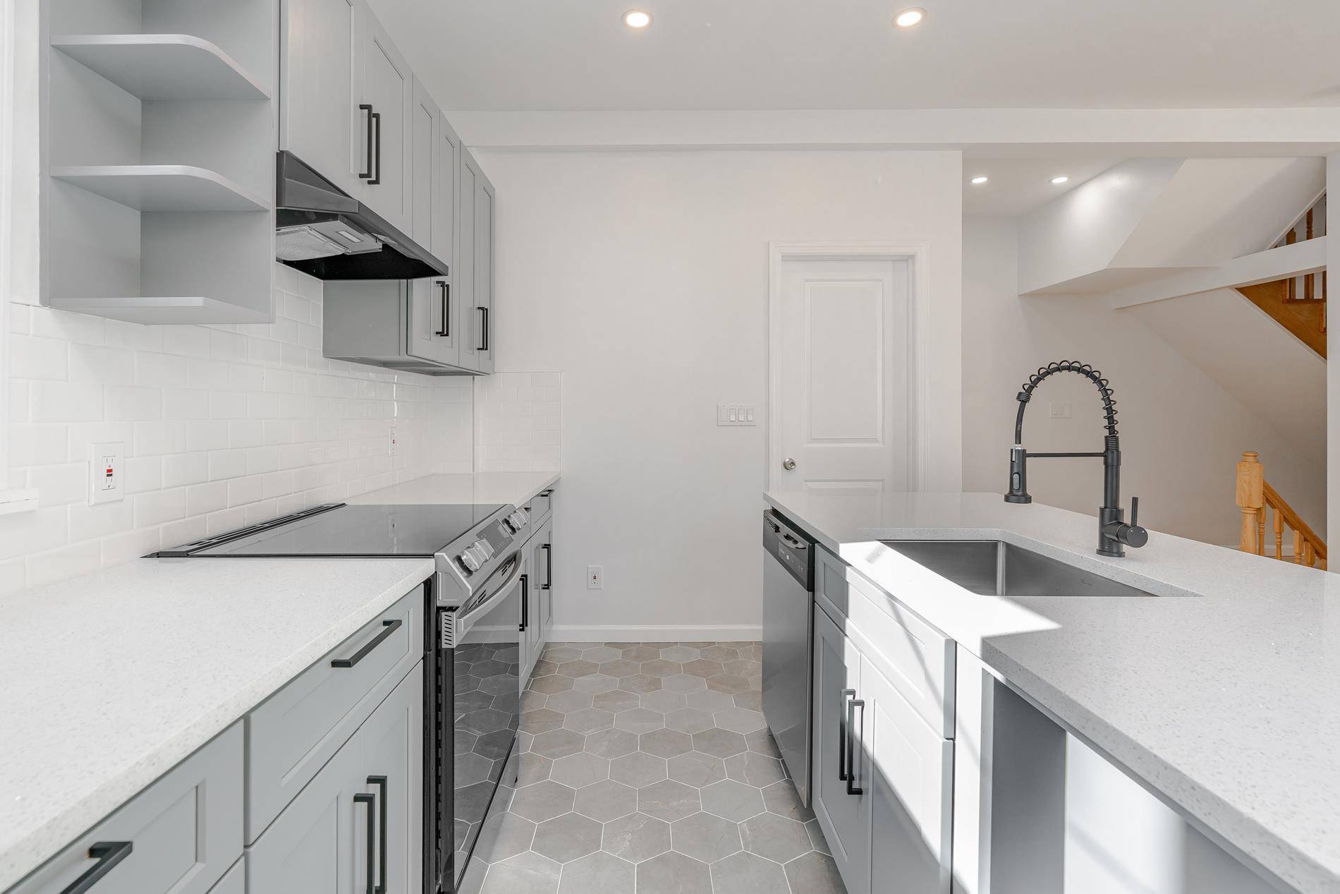 From its unassuming exterior to the eye catching gut renovated interior, this beautifully done single family home will leave you the envy of your neighbors and friends alike.