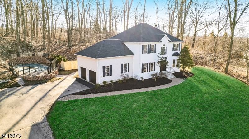 WELCOME HOME ! Gorgeous Colonial with over 150K recent updates nestled on 2.