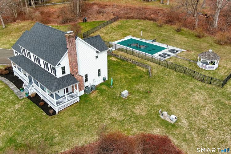 Magnetically sited on a picturesque three acre lot, this beautifully updated Colonial Farmhouse offers the perfect fusion of timeless charm and modern luxury.
