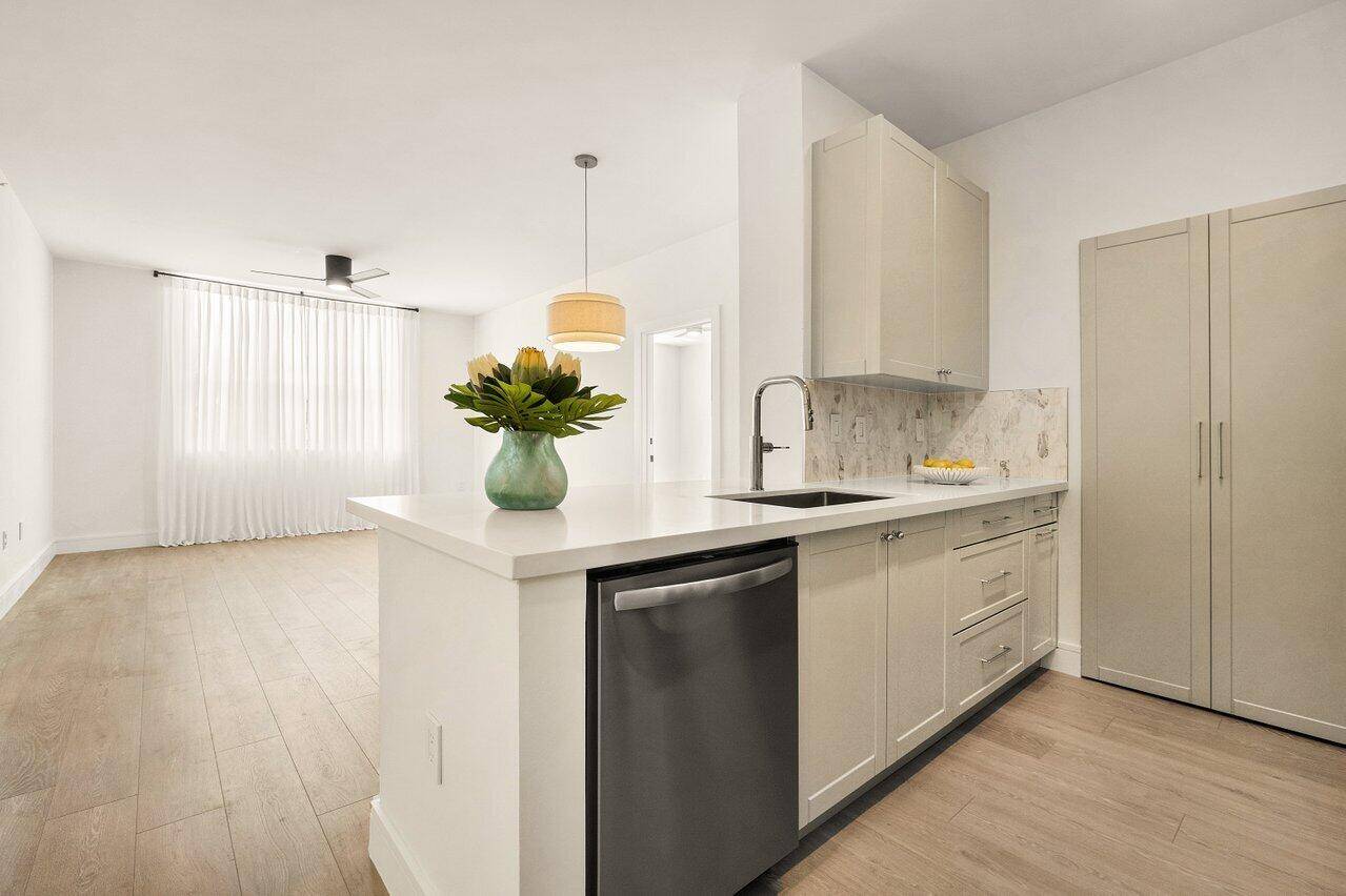 This thoughtfully renovated 2 bedroom, 2 bathroom ground floor condo in The Courtyards City Place offers a rare combination of quality, functionality, and location.