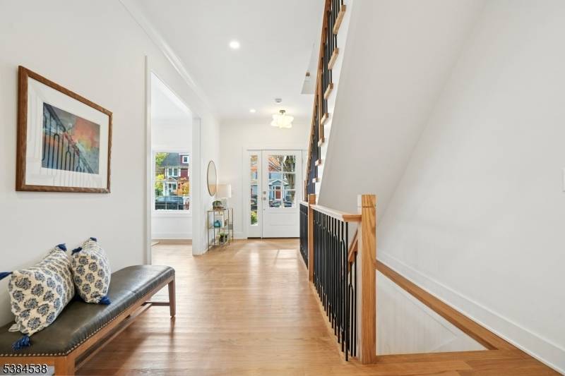 Exceptional custom home, measuring nearly 5, 000 square feet, in a coveted location just steps to NYC trains, park, new state of the art library and vibrant Maplewood Village !