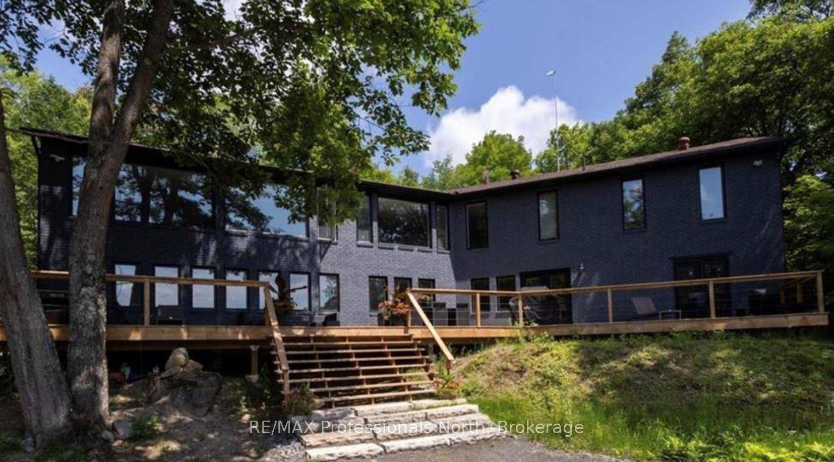 10 acres of privacy in a natural woodland setting with 265 ft frontage on Ril Lake.